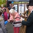 The Mayor distributes commemorative souvenir ‘Castleton Lancs’ fridge magnets to all the school children.  T Young